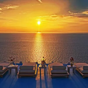 Golden hues painting the sky during an amazing Mykonos sunset