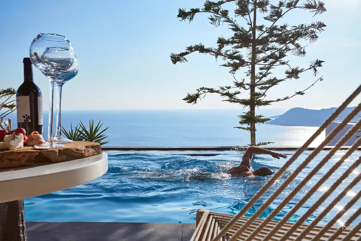 Luxury infinity pool at Myconian UTOPIA Hotel, overlooking the Aegean Sea
