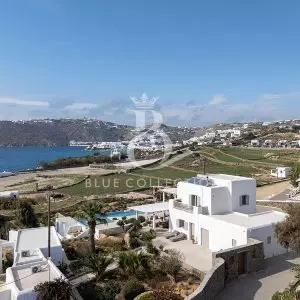 Panoramic view of Mykonos Island with traditional white houses and the Aegean Sea