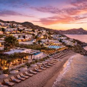 Four Seasons Mykonos resort and luxury Mykonos Villas at Kalo Livadi beach during sunset